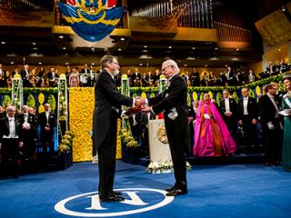 George Smith receiving his Nobel Prize