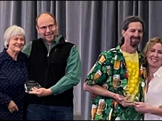 Kathy Newton and David Braun receiving their awards at the Maize Conference