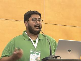 Shawn Thomas presenting at podium