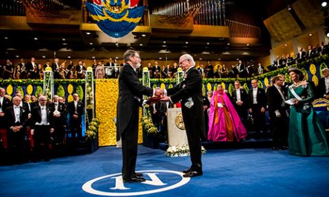 George Smith receiving his Nobel Prize